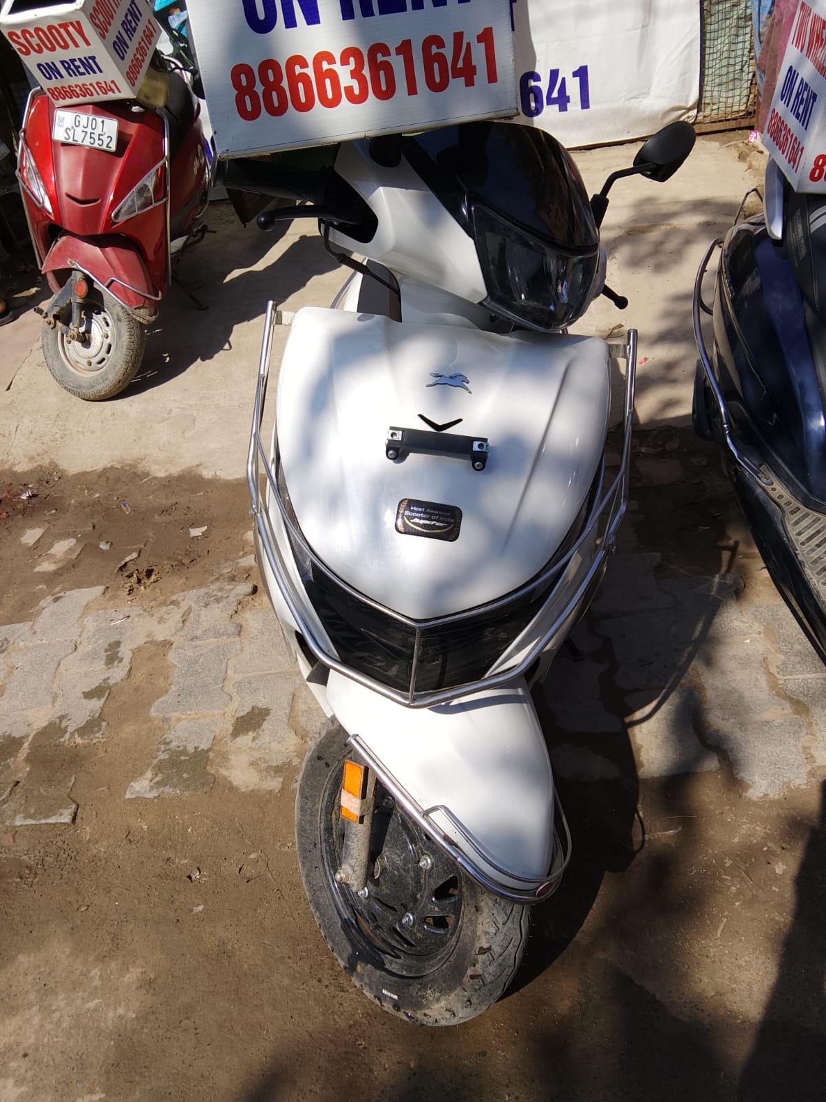 White premium scooter available for rent in Vrindavan