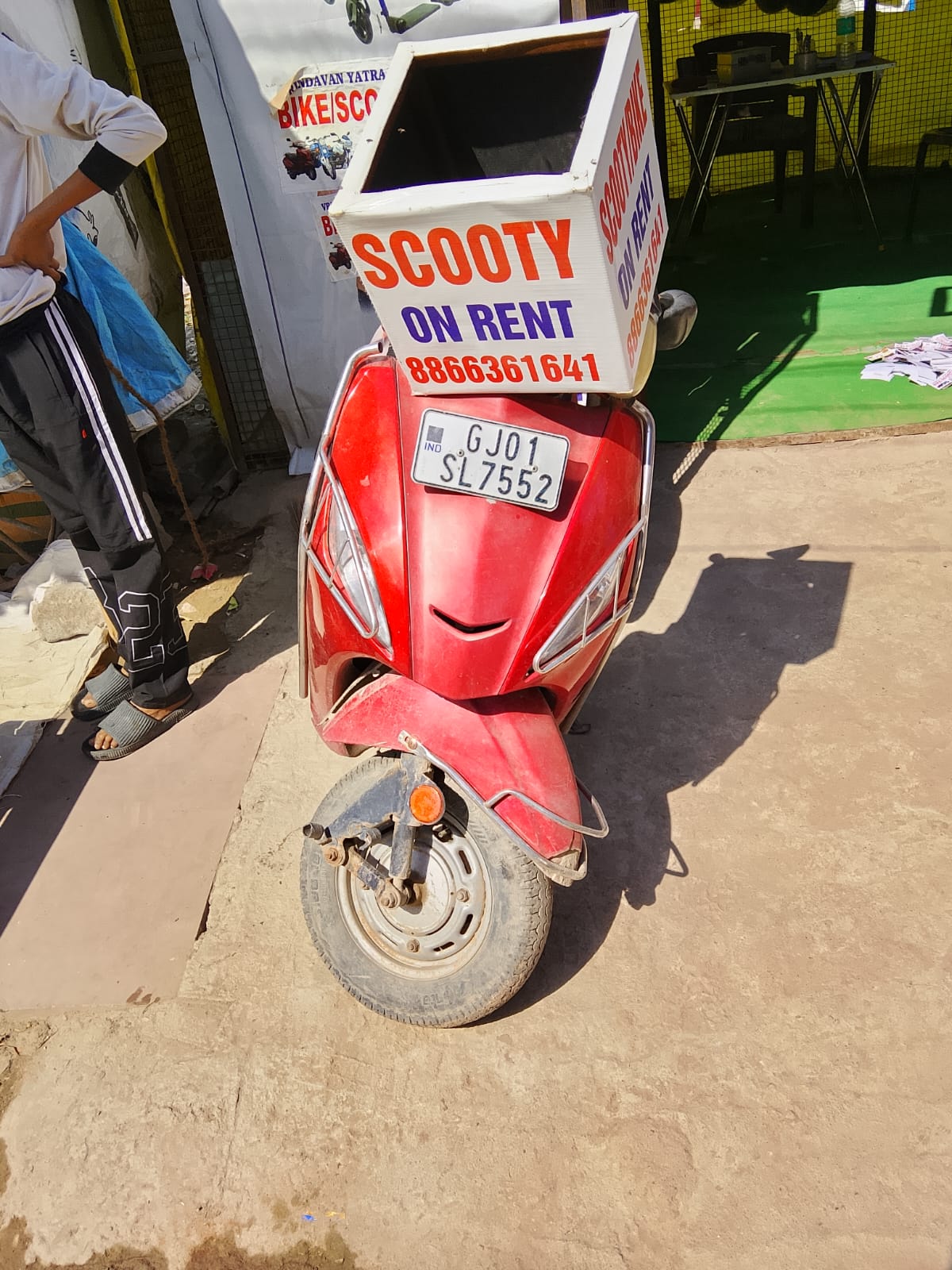Red scooty for rent near Prem Mandir Vrindavan